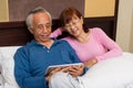 Senior couple sharing entertainment Royalty Free Stock Photo