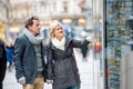 Senior couple shopping in centre of the city. Winter Royalty Free Stock Photo