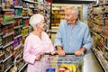 Senior couple shopping in grocery store Royalty Free Stock Photo