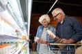 Senior Couple Shopping in Supermarket Royalty Free Stock Photo