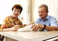 Senior couple signing document Royalty Free Stock Photo