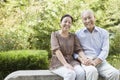 Senior Couple Sitting on a Bench Royalty Free Stock Photo