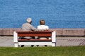 Senior couple sitting on bench