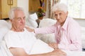 Senior Couple Sitting In Hospital Royalty Free Stock Photo