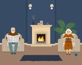 Senior couple is sitting in the living room near the fireplace Royalty Free Stock Photo