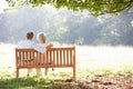 Senior couple sitting outdoors