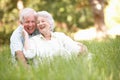 Senior Couple Sitting In Park Royalty Free Stock Photo