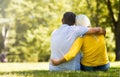 Senior Couple Sitting In Park Royalty Free Stock Photo