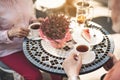 Old male and female enjoying hot drink outside Royalty Free Stock Photo