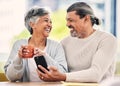Senior couple, smartphone and coffee for laugh, comic meme or funny video on web, blog or internet in morning. Mature