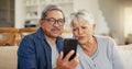 Senior couple, smartphone and video call in living room sofa, conversation and joyful. Grandparents, technology and