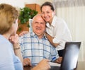 Senior couple with social worker at home Royalty Free Stock Photo