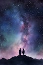 Senior couple standing on a mountain top looking at the milky way Royalty Free Stock Photo