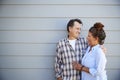Senior Couple Standing Outside Grey Clapboard House Royalty Free Stock Photo