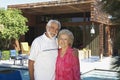 Senior Couple Standing Outside House Royalty Free Stock Photo