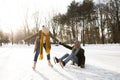 Senior couple in sunny winter nature ice skating. Royalty Free Stock Photo