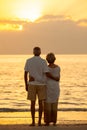 Senior Couple Sunset Tropical Beach Royalty Free Stock Photo