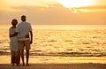 Senior Couple Sunset Tropical Beach Royalty Free Stock Photo