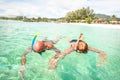 Senior couple swimming on tropical paradise beach in Koh Lipe Royalty Free Stock Photo