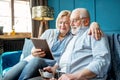 Senior couple with tablet at home Royalty Free Stock Photo