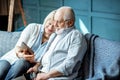 Senior couple with tablet at home Royalty Free Stock Photo