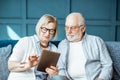 Senior couple with tablet at home Royalty Free Stock Photo