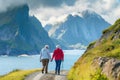 A senior couple taking a brisk walk in a scenic location. Royalty Free Stock Photo