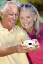 Senior Couple Taking Photograph Digital Camer Royalty Free Stock Photo