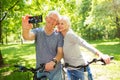 Senior couple taking selfie