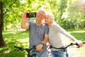 Senior couple taking selfie