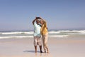 Senior couple taking selfie with mobile phone on beach Royalty Free Stock Photo