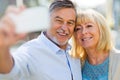 Senior couple taking selfie Royalty Free Stock Photo