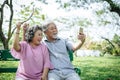 Senior couple taking a selfie photo with smart phone Royalty Free Stock Photo