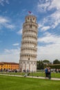 Senior couple taking selfies in front of the famous Leaning Tower of Pisa Royalty Free Stock Photo