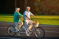 Senior couple on tandem bike.