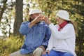 Senior couple toast each other