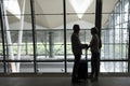 Senior couple traveling airport scene