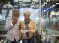 Senior couple traveling airport scene Concept Royalty Free Stock Photo