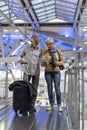Senior couple traveling airport scene Royalty Free Stock Photo