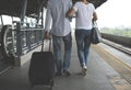 Senior couple traveling train station