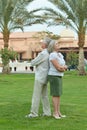 Senior couple at tropic hotel garden Royalty Free Stock Photo