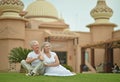 Senior couple at tropic hotel garden Royalty Free Stock Photo