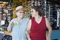 Senior Couple Trying On Funny Sunglasses Royalty Free Stock Photo