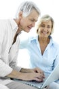 Senior couple using laptop Royalty Free Stock Photo