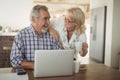 Senior couple using laptop Royalty Free Stock Photo