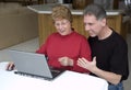 Senior Couple Using Laptop, Internet, Technology