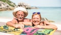 Senior couple vacationer having genuine fun on Koh Samui tropical beach in Thailand - Excursion tour in exotic scenario Royalty Free Stock Photo