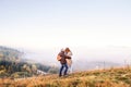 Senior couple on a walk in an autumn nature. Royalty Free Stock Photo