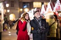 Senior couple on a walk in a city in winter. Royalty Free Stock Photo