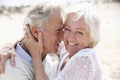 Senior Couple Walking Along Beach Together Royalty Free Stock Photo